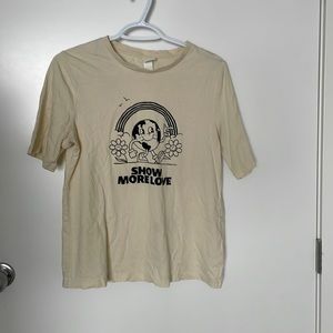 Graphic T-shirt. From H&M, size small in a dusty pastel yellow